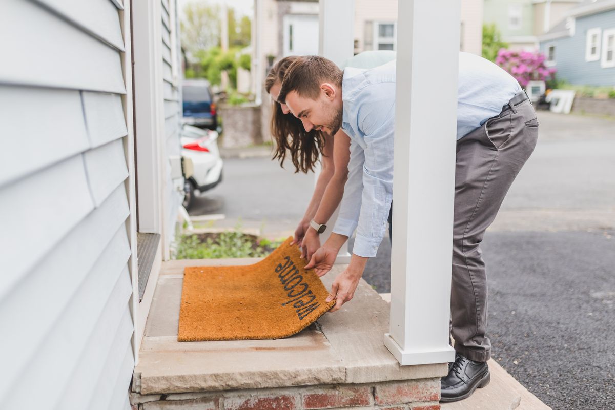 Welcome foot mat at a house entrance