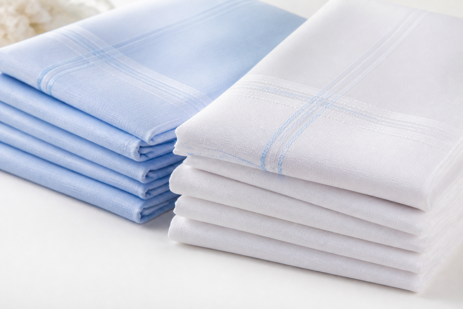 Stacks of folded cotton handkerchiefs